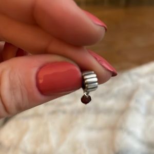 Pandora spacer charm with purple stone